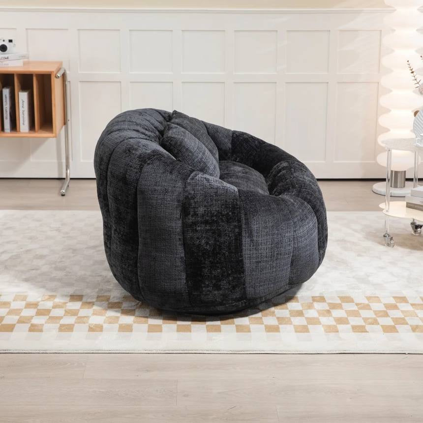 Canapé pouf 2 places en chenille, coloris anthracite, en situation, trois quarts
