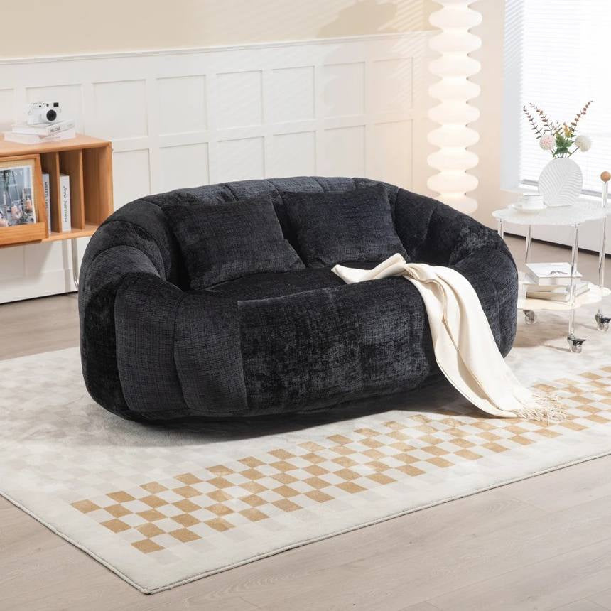 Canapé pouf 2 places en chenille, coloris anthracite, en situation, avec le plaid