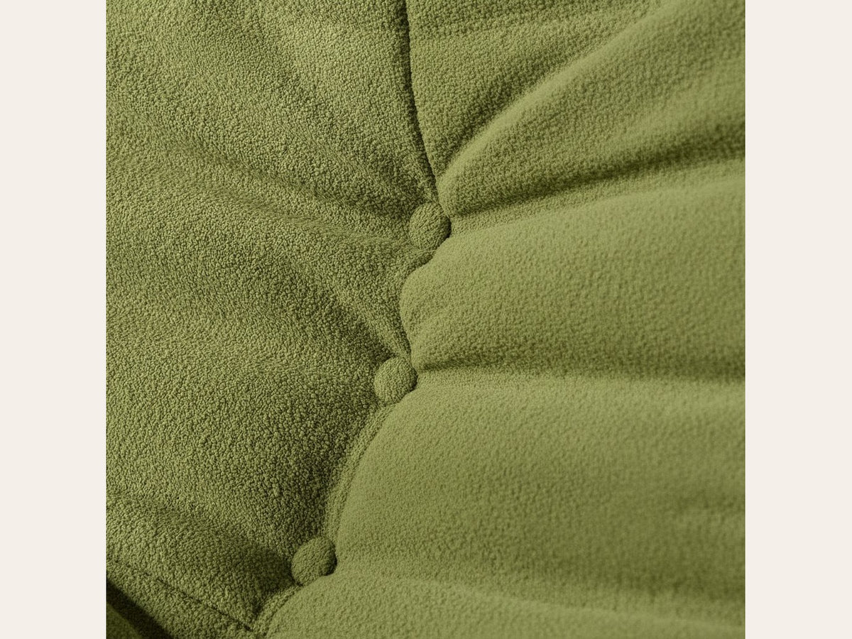 Canapé modulable bas 2 places, gros plan sur le velours teddy vert olive