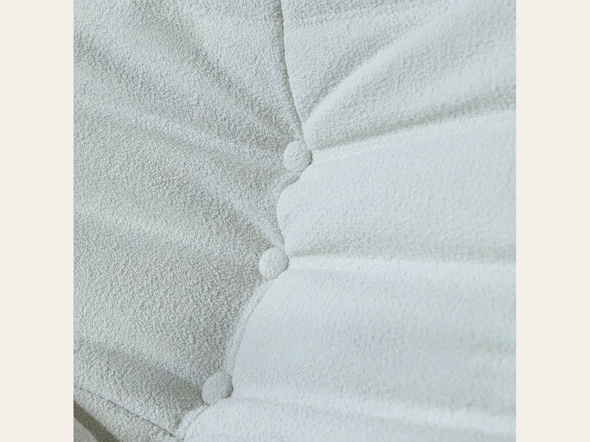 Canapé modulable bas 3 places, gros plan sur le velours teddy blanc écru
