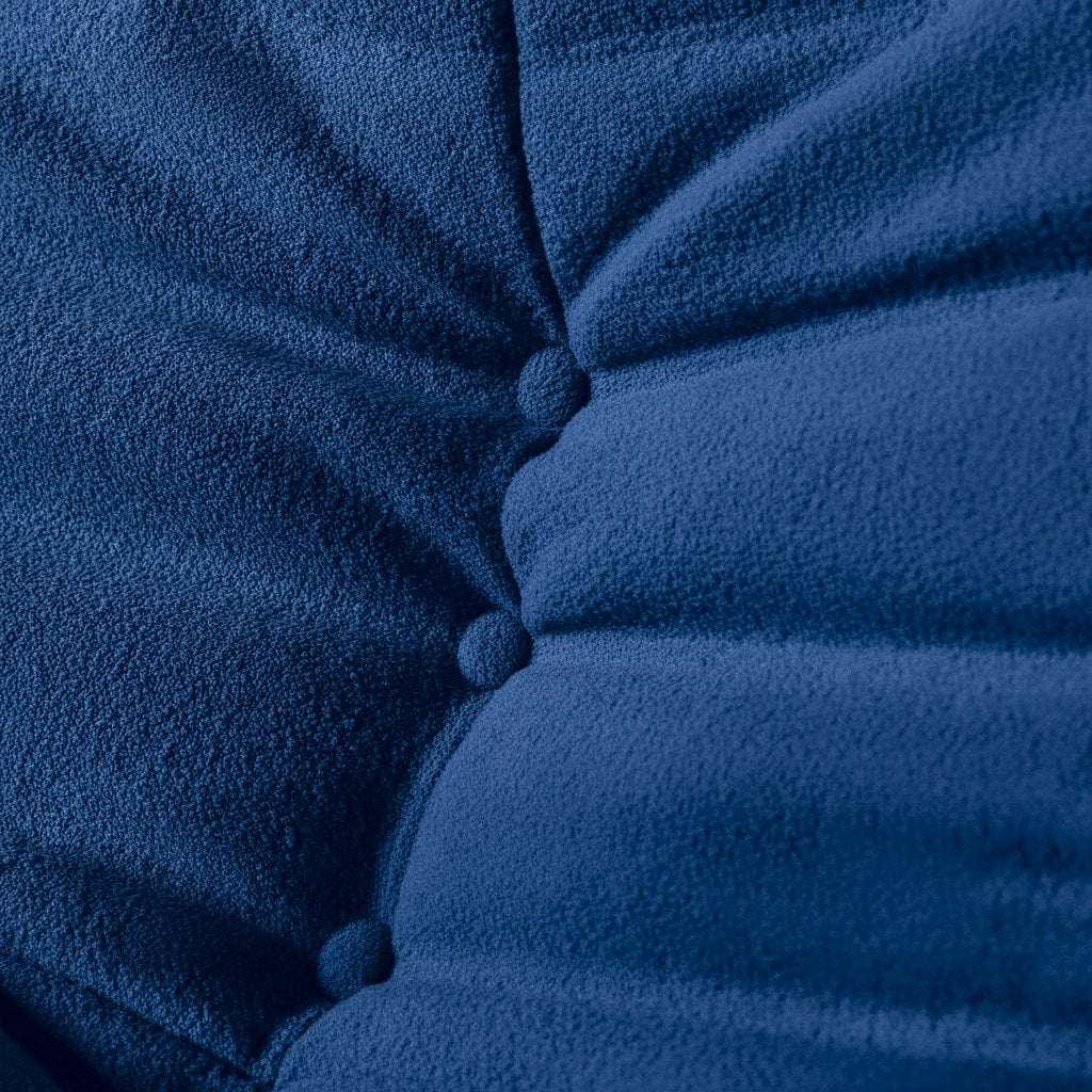 Canapé modulable bas 3 places, gros plan sur le velours teddy bleu marine