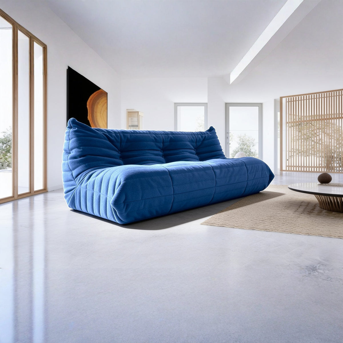 Canapé modulable bas 3 places, velours teddy bleu marine, en situation dans un intérieur