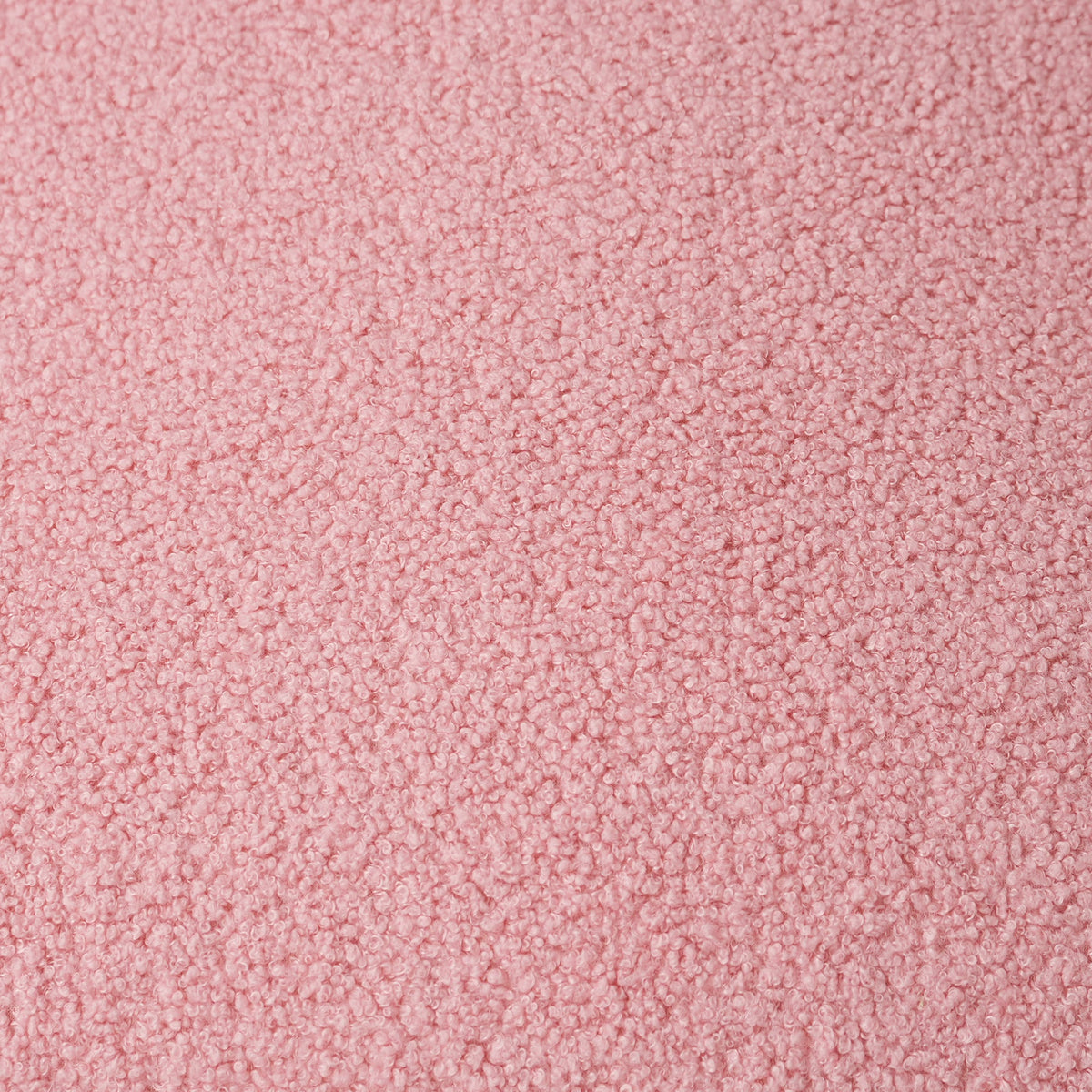 Canapé nuage 3 places avec accoudoirs, gros plan sur le tissu bouclé rose poudré