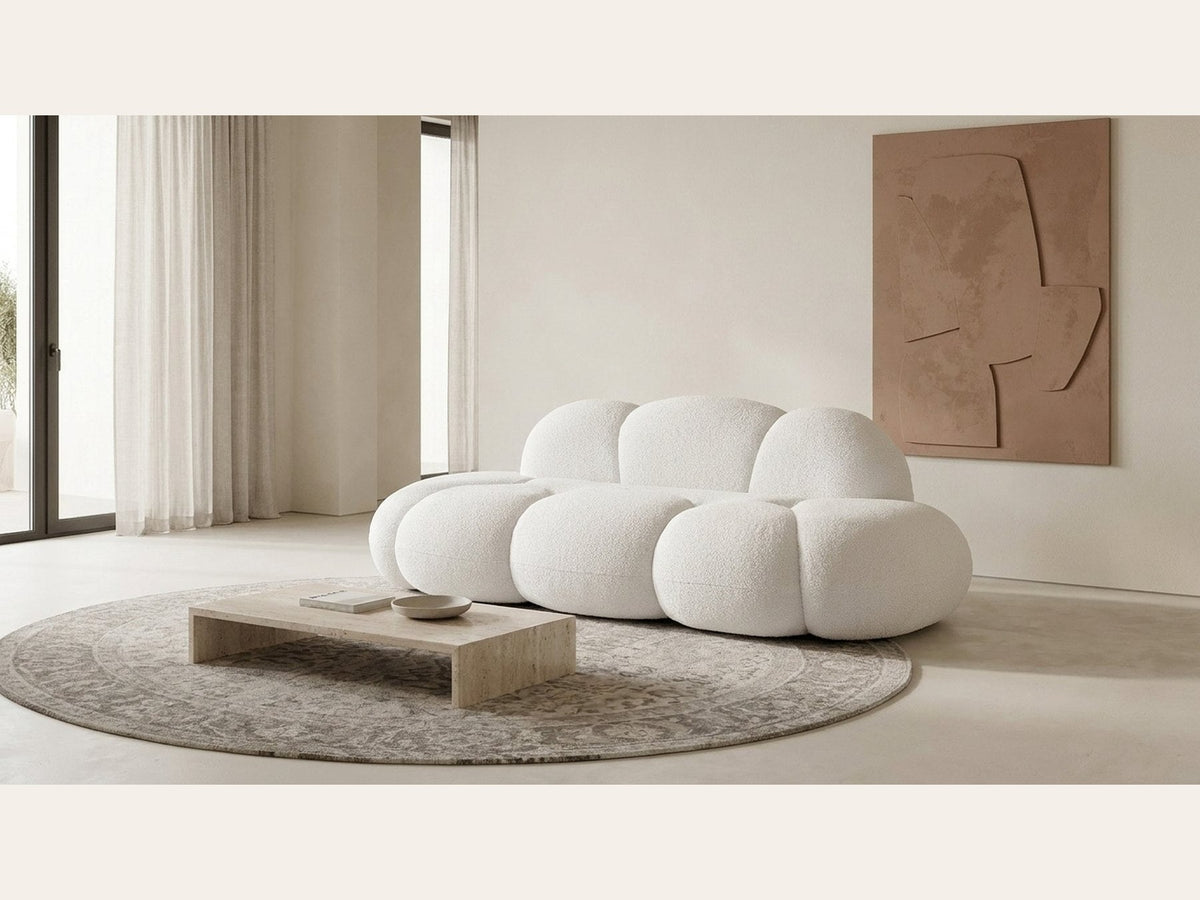 Canapé nuage 3 places sans accoudoir, tissu bouclé blanc écru, en situation dans un salon clair