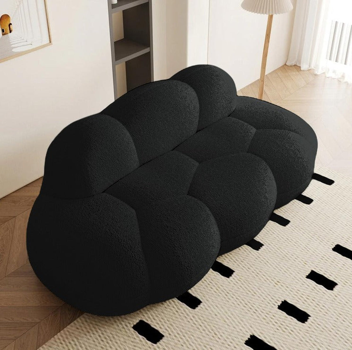 Canapé nuage 3 places sans accoudoir, tissu bouclé noir charbon, vue de trois quarts