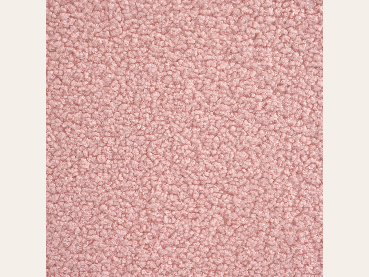 Canapé nuage 3 places sans accoudoir, gros plan sur le tissu bouclé rose poudré