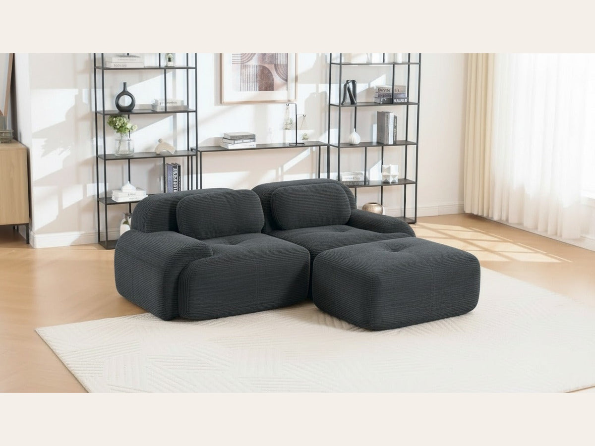 Canapé méridienne 2 places gris, de trois quarts dans un salon