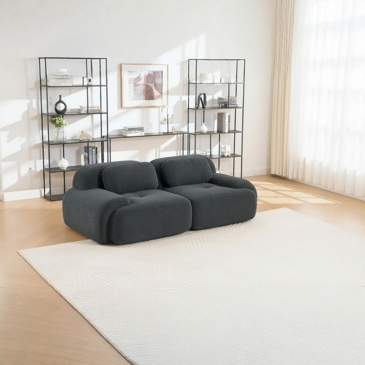 Canapé modulaire 2 places gris, de trois quarts dans un salon
