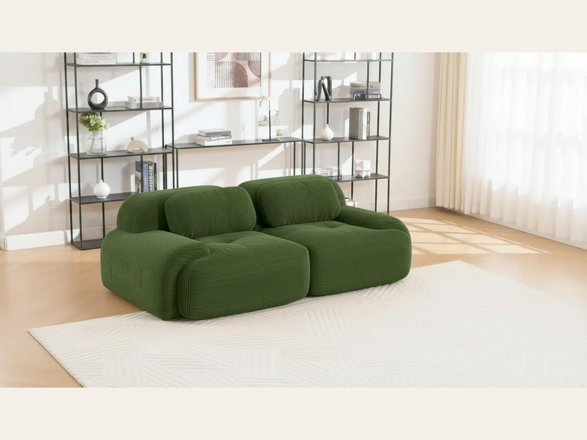 Canapé modulaire 2 places vert, de trois quarts dans un salon