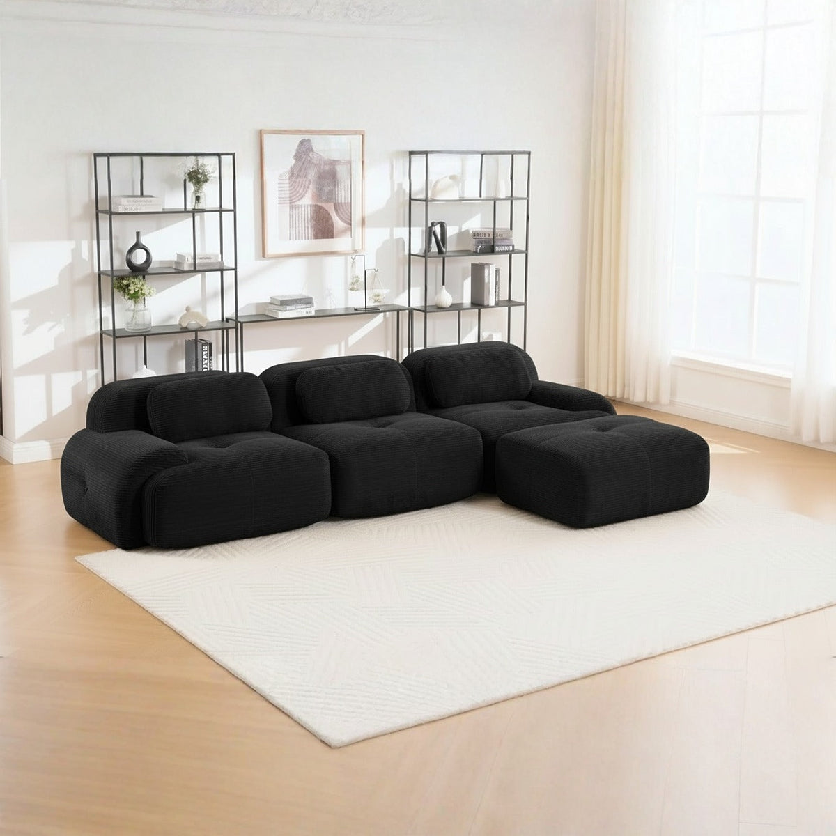 Canapé méridienne 3 places noir, de trois quarts dans un salon