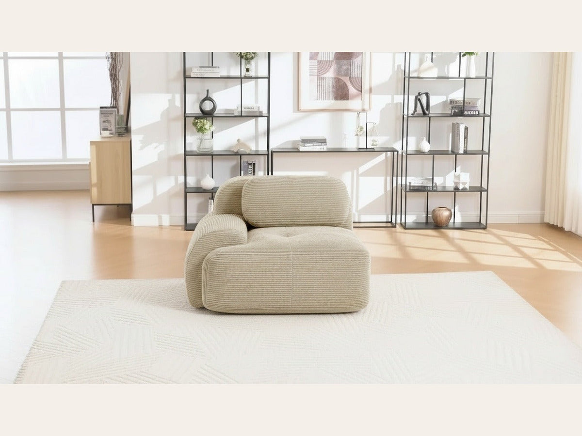 Fauteuil modulable beige, de face dans un salon