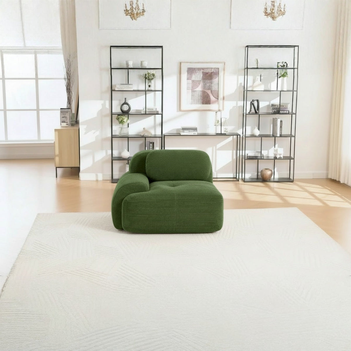 Fauteuil modulable vert, de face dans un salon