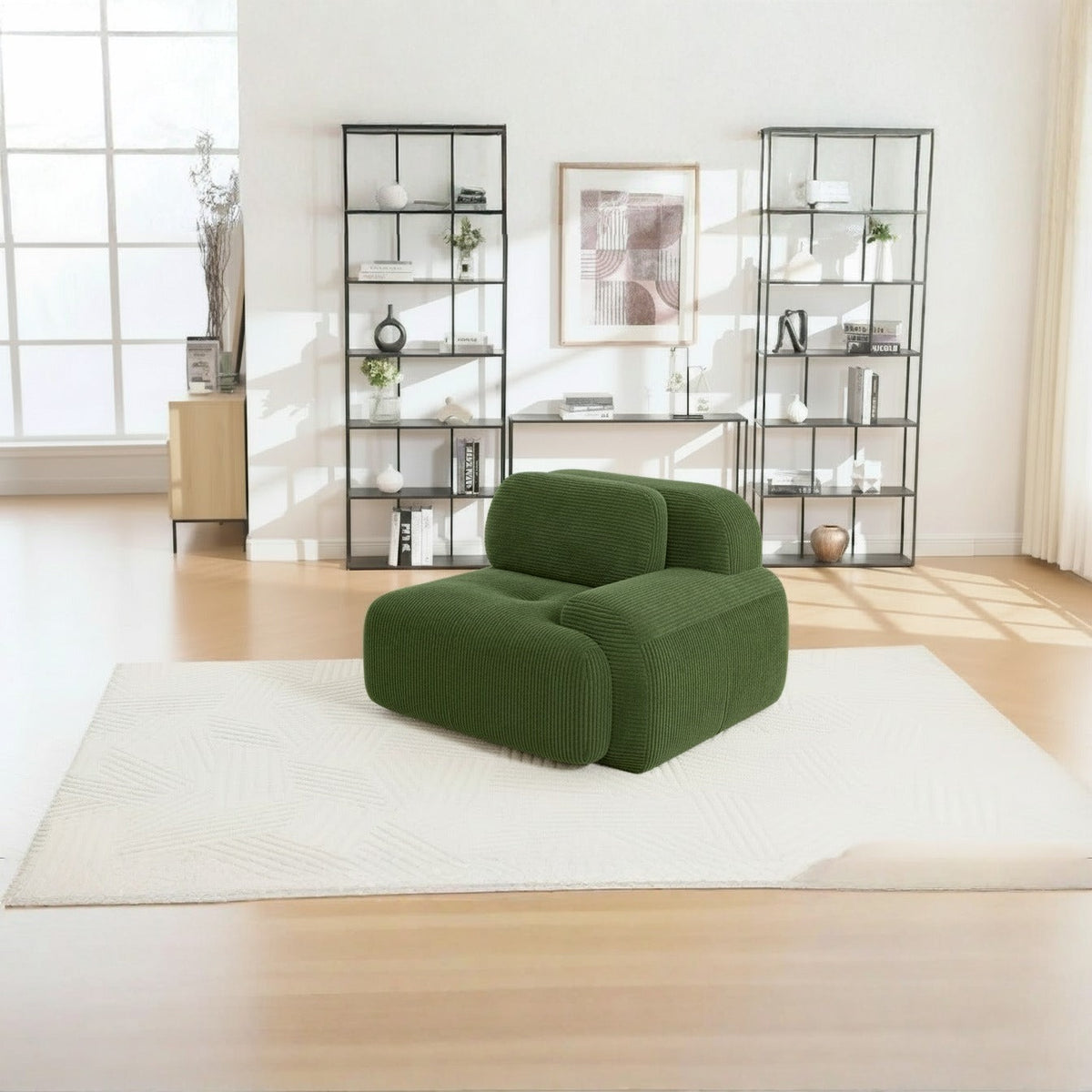 Fauteuil modulable vert, de trois quarts dans un salon