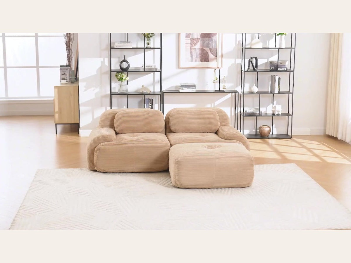 Canapé méridienne 2 places beige, de face dans un salon