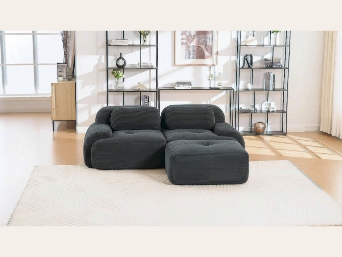 Canapé méridienne 2 places gris, de face dans un salon