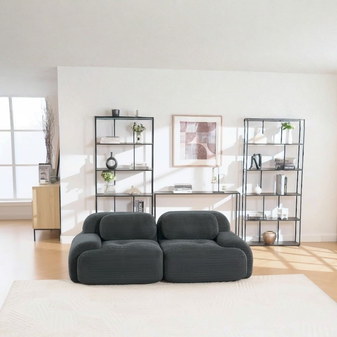 Canapé modulaire 2 places gris, de face dans un salon