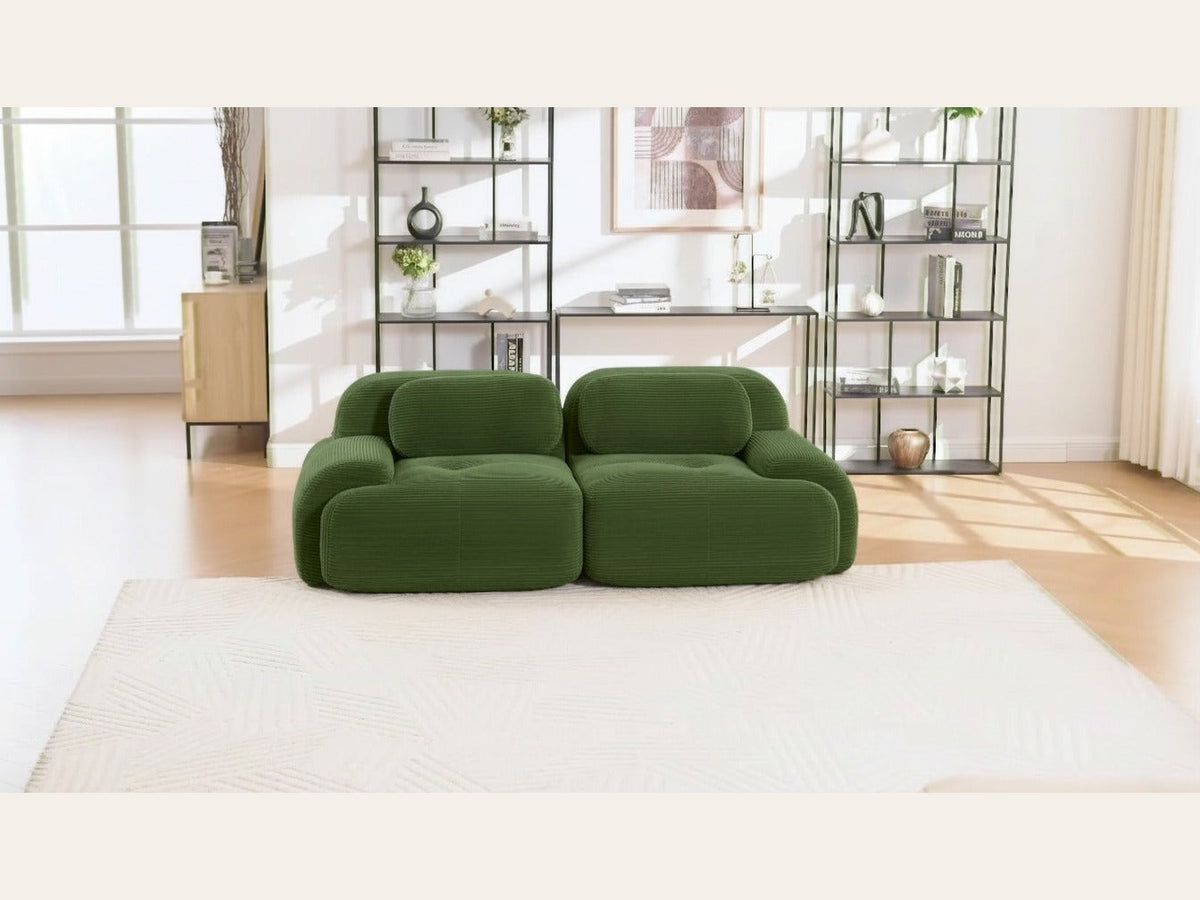 Canapé modulaire 2 places vert, de face dans un salon