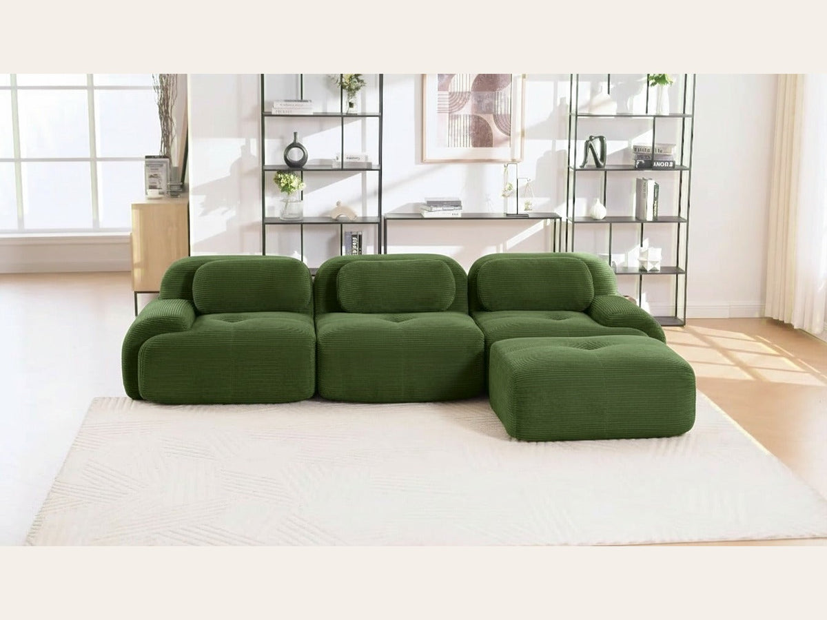 Canapé méridienne 3 places vert, de face dans un salon