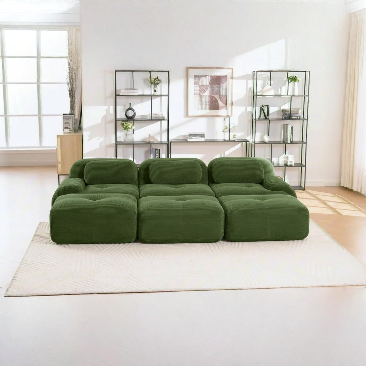 Canapé profond 3 places vert, de face dans un salon