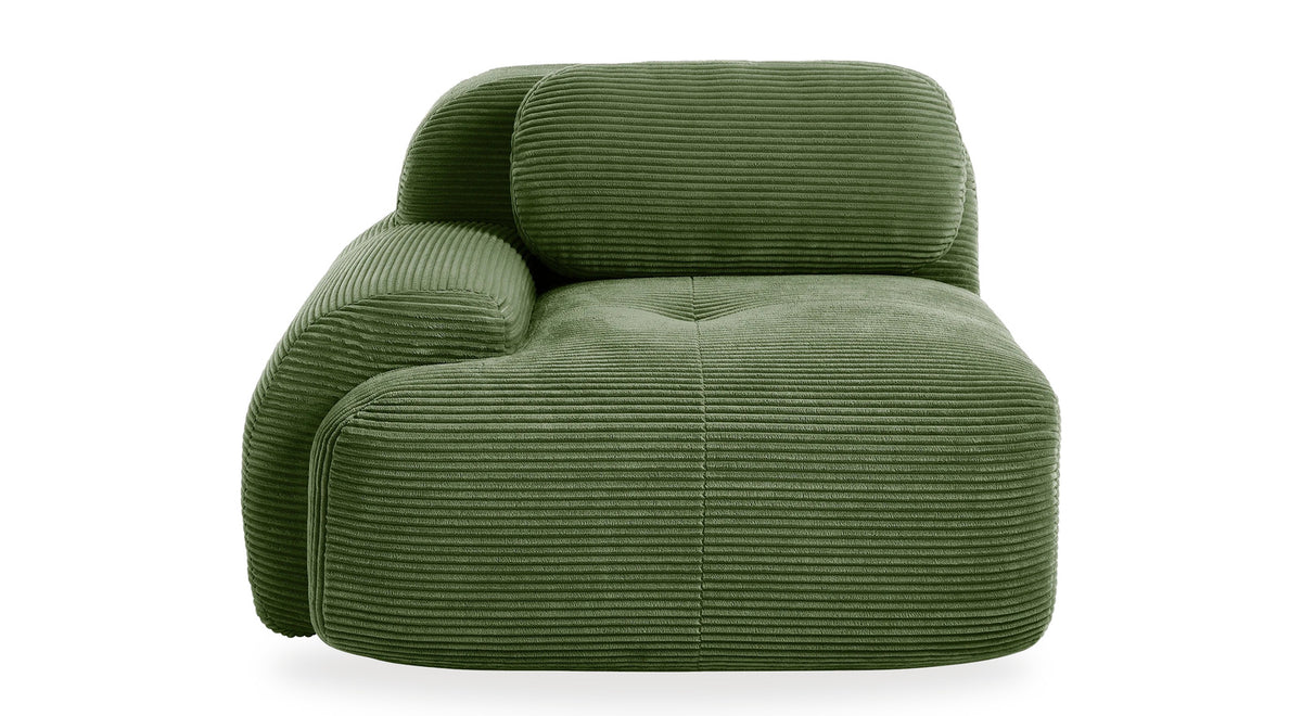 Fauteuil modulable vert, vue de trois quarts sur fond blanc, accoudoir à gauche sur l'image