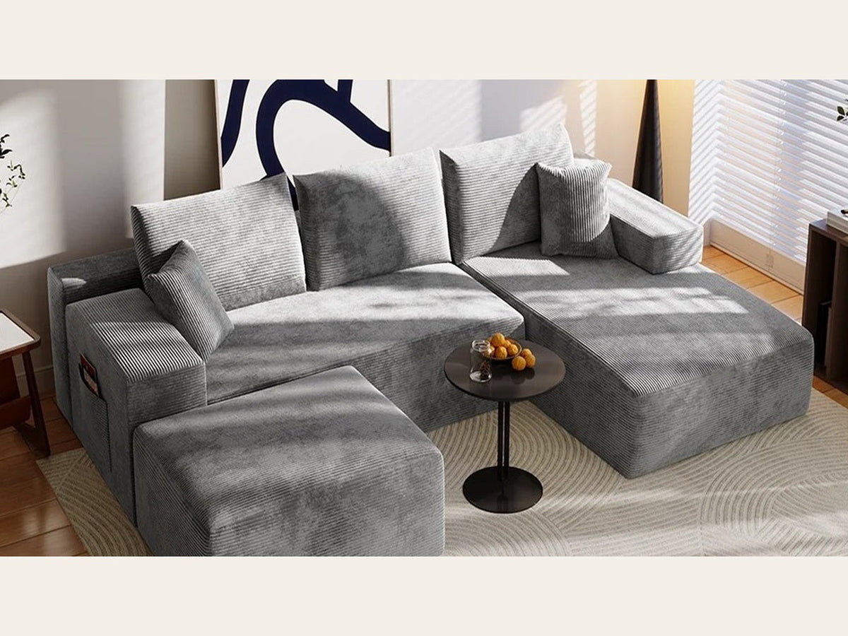 Canapé en U modulable en velours côtelé gris, collection Nimbo, décor trois quarts avant