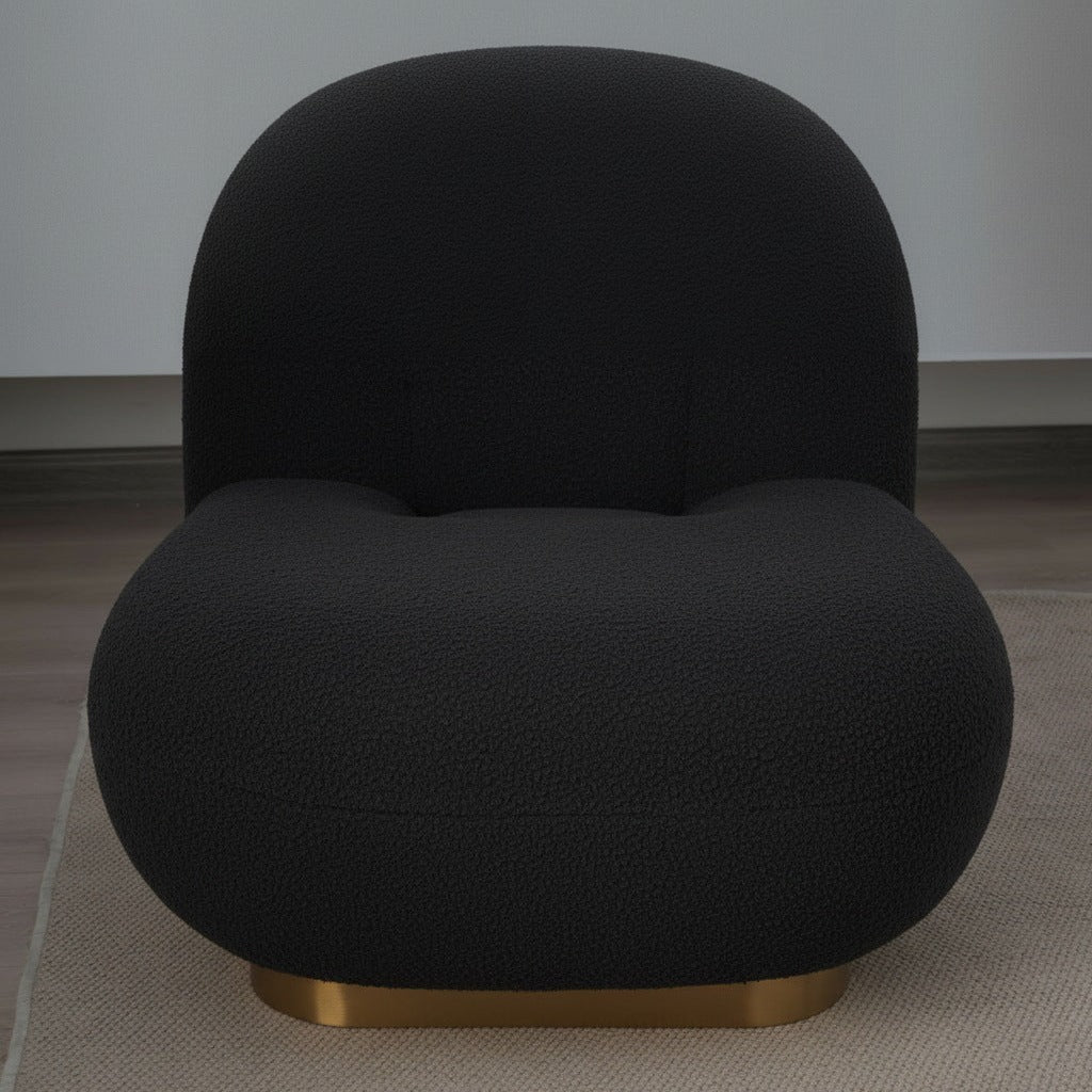 Fauteuil nuage pivotant 360 en tissu bouclette noir charbon, vue rapprochée de l'assise et du socle doré