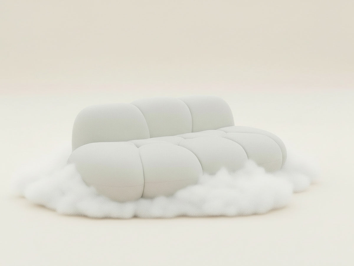 Canapé nuage blanc aux formes arrondies, posé sur un nuage