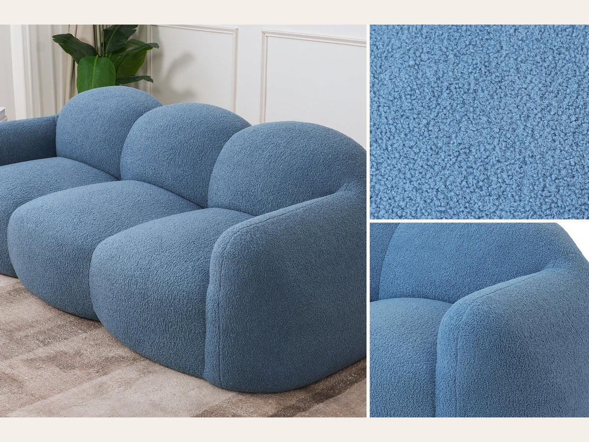 Canapé nuage 3 places avec accoudoirs, gros plan sur le tissu bouclé bleu azur