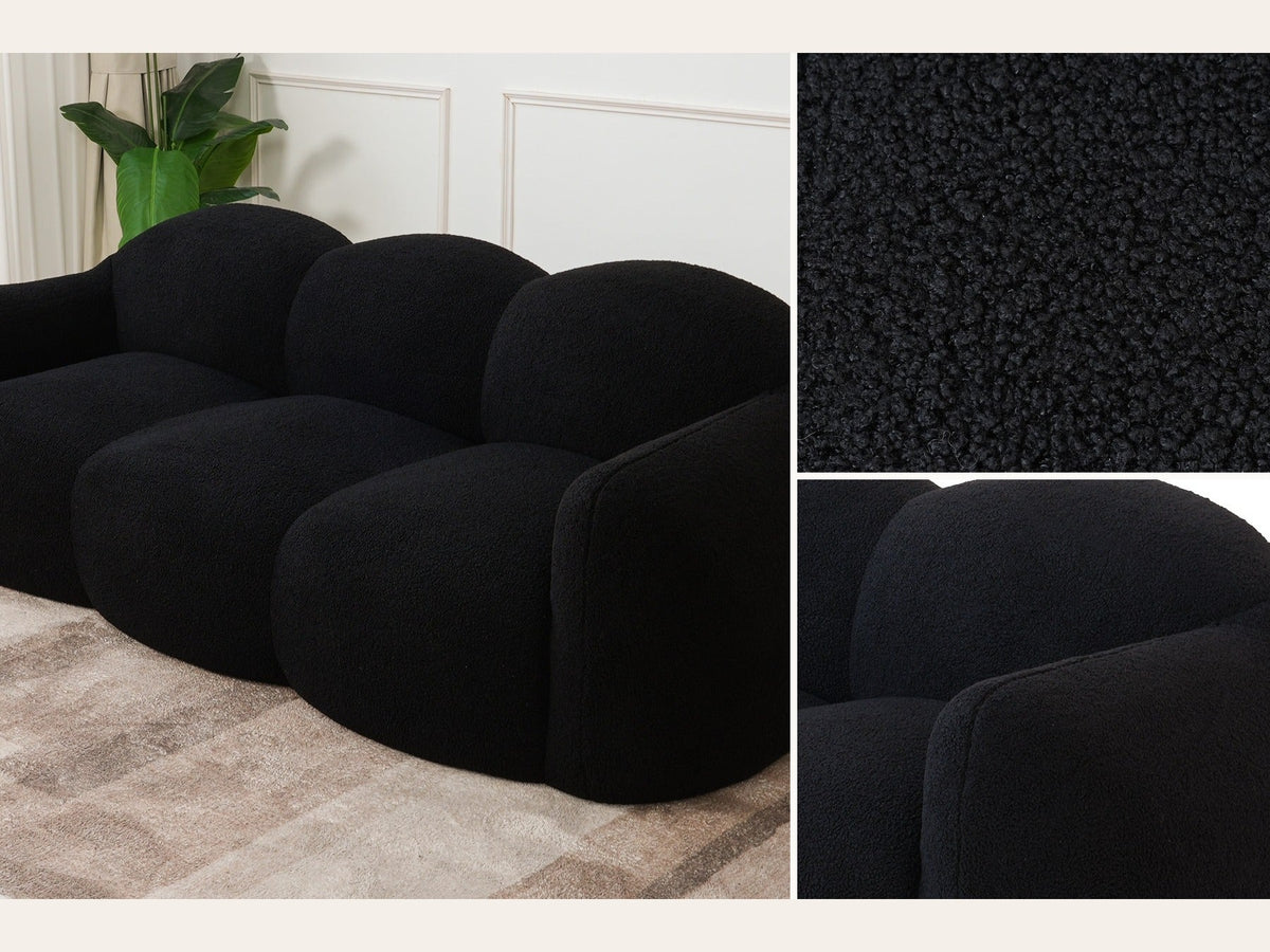 Canapé nuage 3 places avec accoudoirs, gros plan sur le tissu bouclé noir charbon